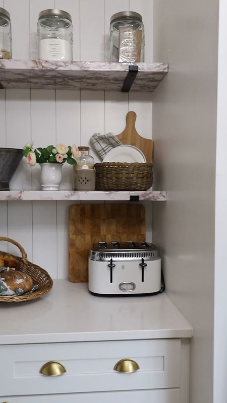 Kitchen shelf styling: faux marble shelves, spring styling, kitchen styling 

#LTKstyletip #LTKVideo #LTKhome