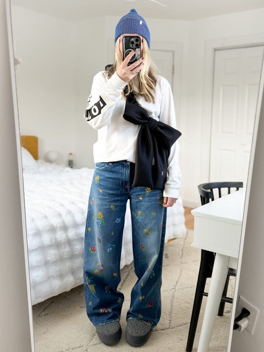 My low bar outfit this winter has been baggy jeans, Moonboots, and boyish long-sleeve tees (often stolen from my husband or kids). 

If it’s cold, I’ll slide Athleta’s fleece-lined leggings or Uniqlo’s heattech pants under the jeans. And then make the whole thing look intentional with a cute beanie and this fun bag. All baggy jeans work here, but these floral ones were a recent birthday add and they’re great.
