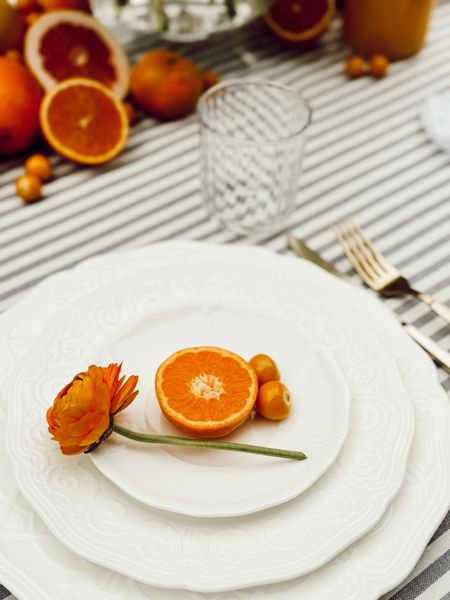 Mother’s Day Tablescape with fresh oranges and pops of blue & white.

#LTKhome #LTKSeasonal #LTKstyletip
