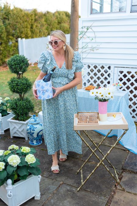 This spring maxi dress is darling and so happy for nice weather and outdoor entertaining once again 💙

#mothersday #giftsforher #giftsformom #floralmaxidress #tuckernuck #icebucket #monogrammedicebucket #butlertray #barcart #barware #fauxboxwood #fauxboxwoodtopiary #blueoralprinttablecloth #drinkcaddy #dippedvase

#LTKSeasonal #LTKFind #LTKGiftGuide
