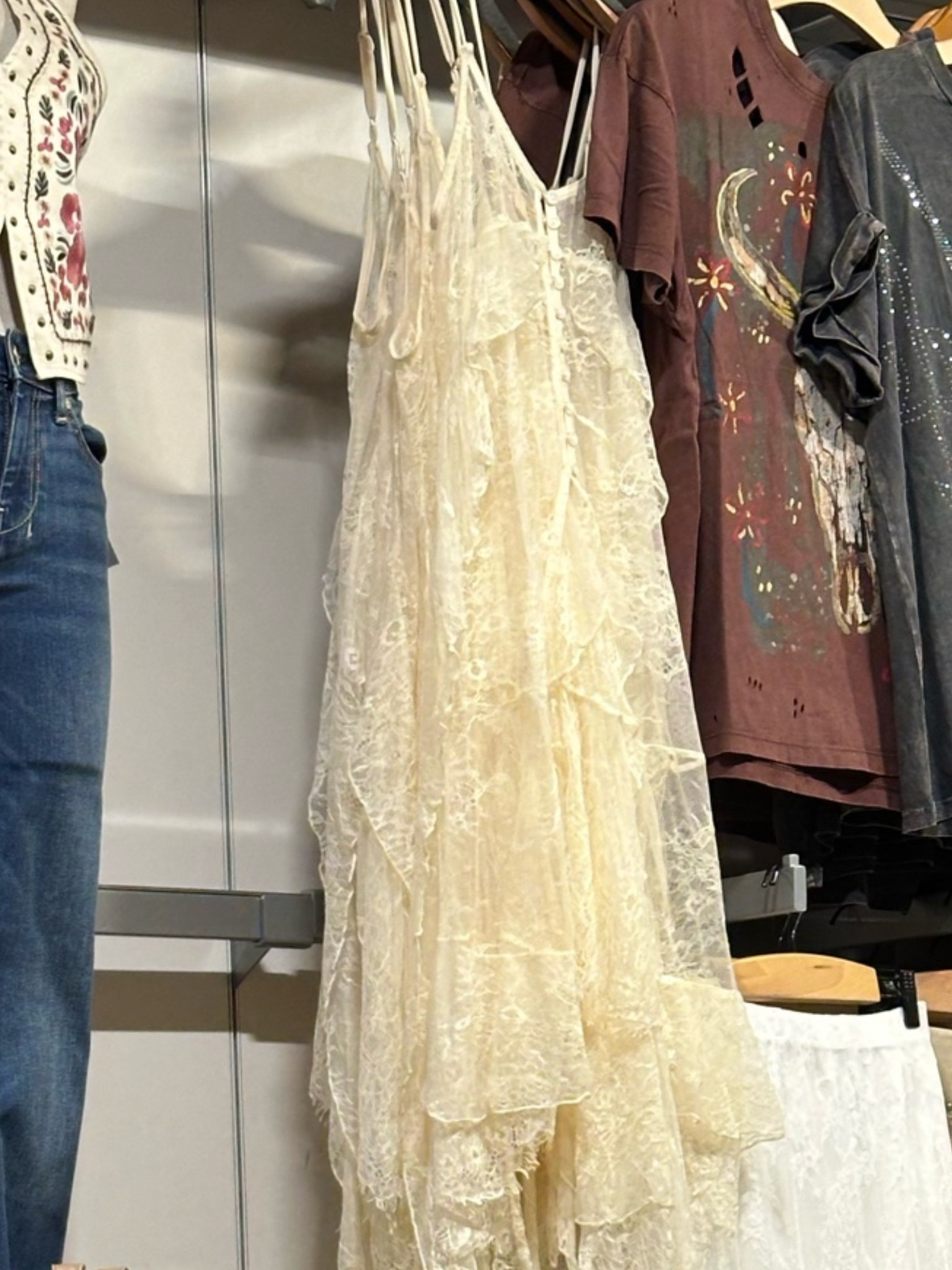 Love this long cream fringe lace tank from buckle! This would be so cute to style for a country concert or festival! Priced at $54 & ranges from sizes S-XL!

#LTKMidsize #LTKPetite