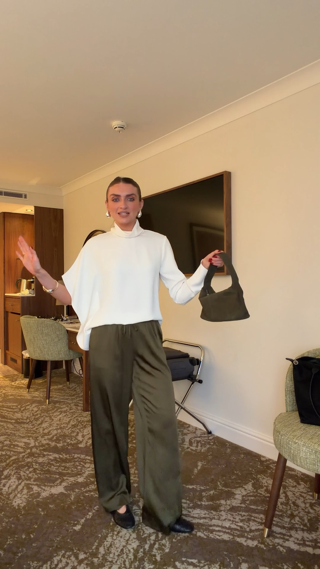 Outfit of the night - dinner in a hotel/spa break

Mango asymmetric blouse - medium 
Abercrombie olive satin trousers - XS Long, I’m 5ft 6
& Other Stories black balls flats
ASOS khaki suede bag 
M&S silver earrings 
Karen Millen silver bangle - older so similar linked


Evening outfit, relaxed dinner outfit, no heels evening outfit, satin trousers