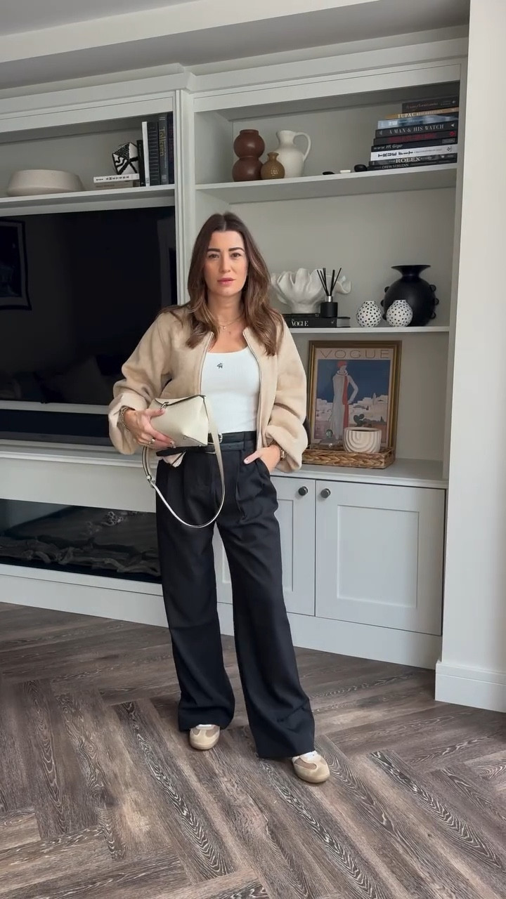 Trans workwear inspo ~ outfit is @4thandreckless @adidas sambas & @toteme t-lock bag for buying meetings in London. 
Wide leg trousers and a vest top are great transitional pieces to layer up with jackets for the season. #ootdinspo #autumnoutfitinspo