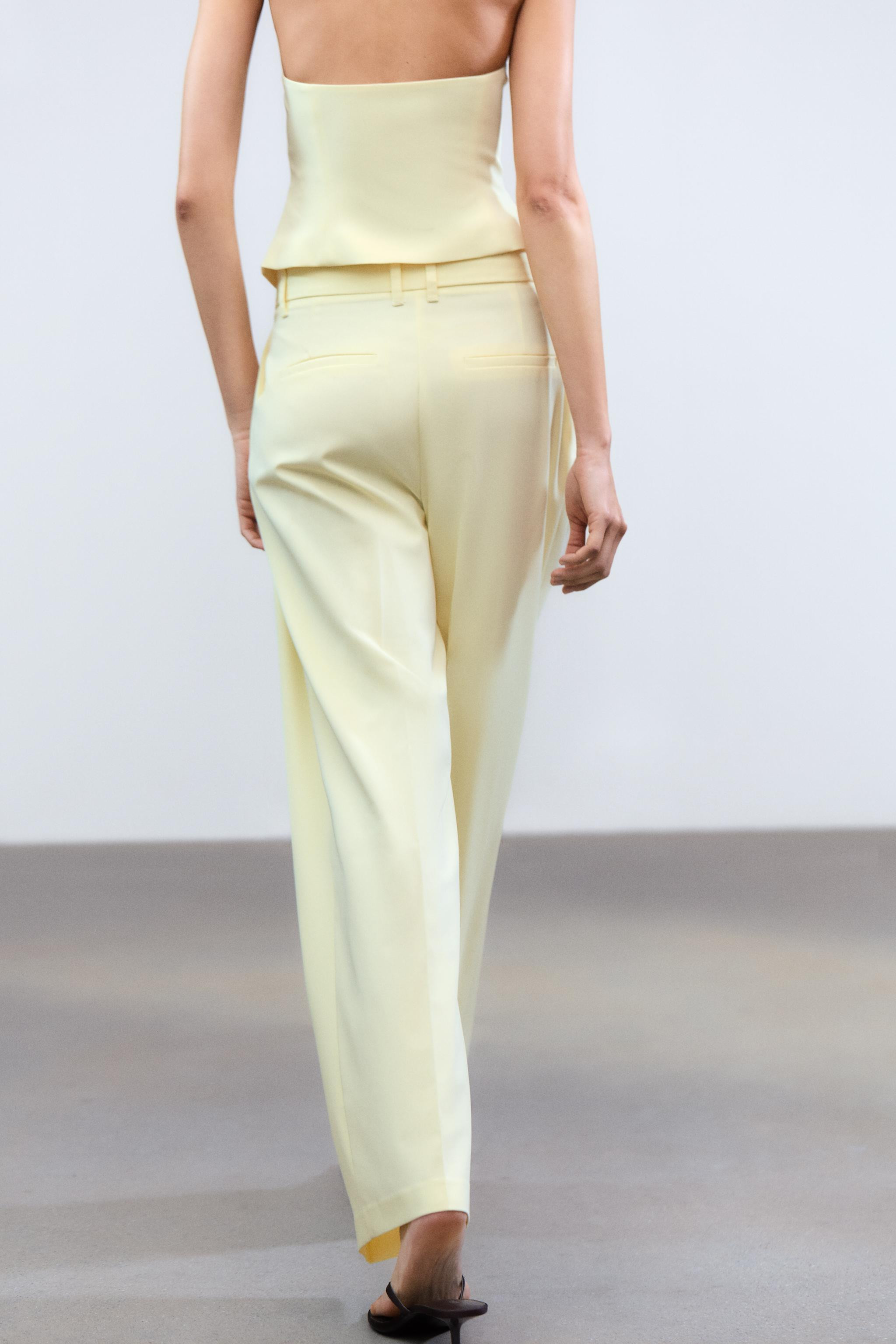 High-waisted pants with belt loops. Double pleat detail. Side pockets and faux back welt pockets.... | Zara US