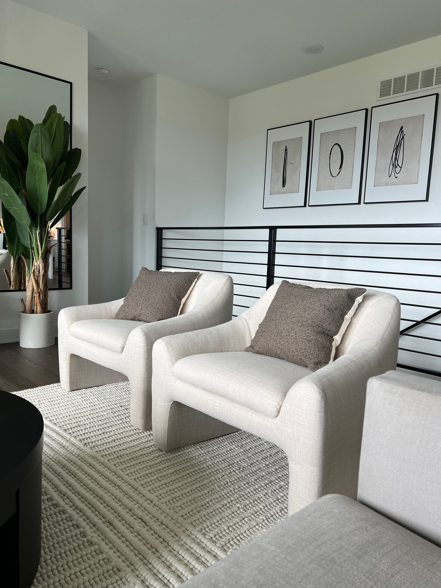 Modern living room views.



#LTKfindsunder100 #LTKhome #LTKstyletip