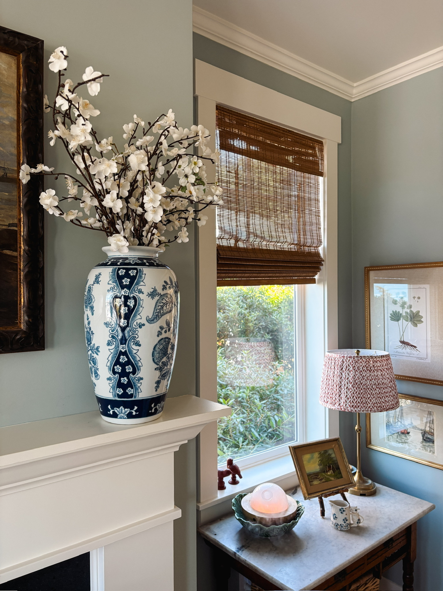 Blue and white vase, bamboo shades, pleated lampshade, botanical framed art 

#LTKHome #LTKSaleAlert #LTKSeasonal