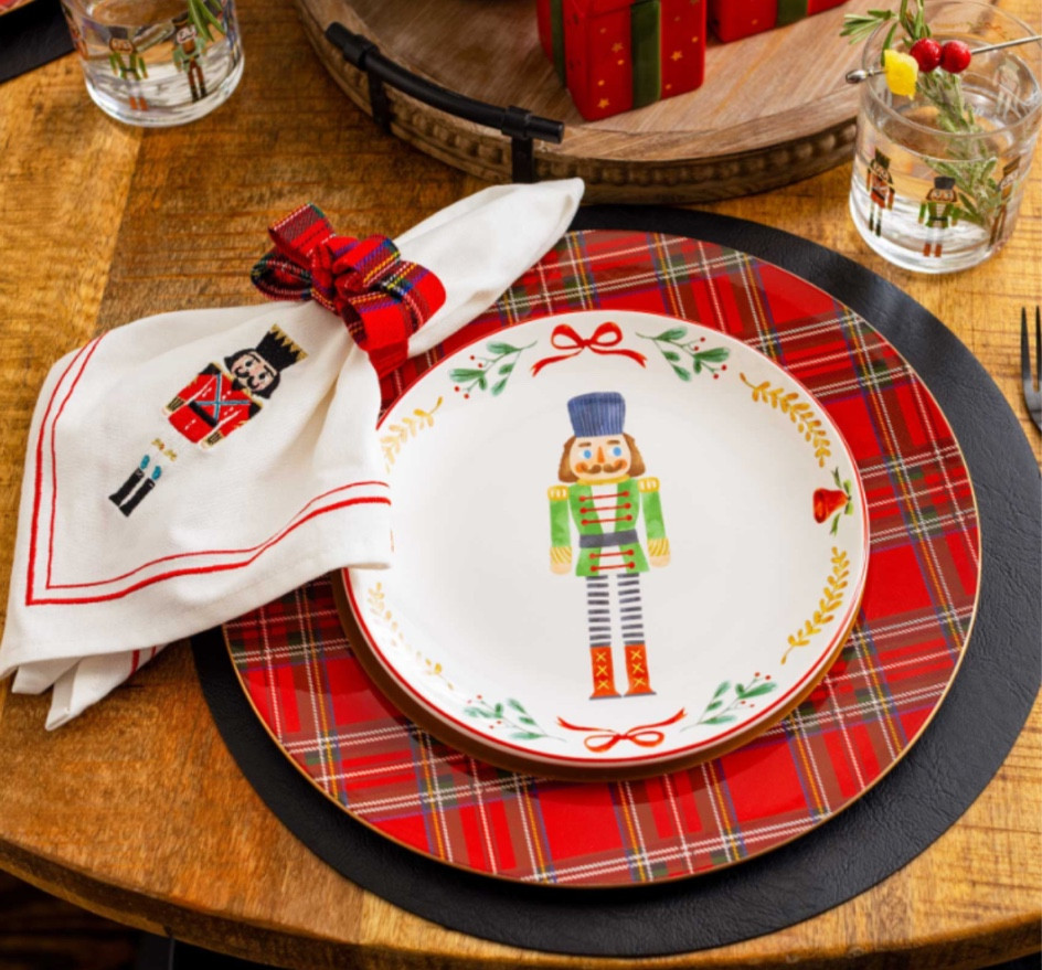 Christmas nutcracker and plaid table place setting 

#LTKHoliday #LTKSeasonal #LTKhome