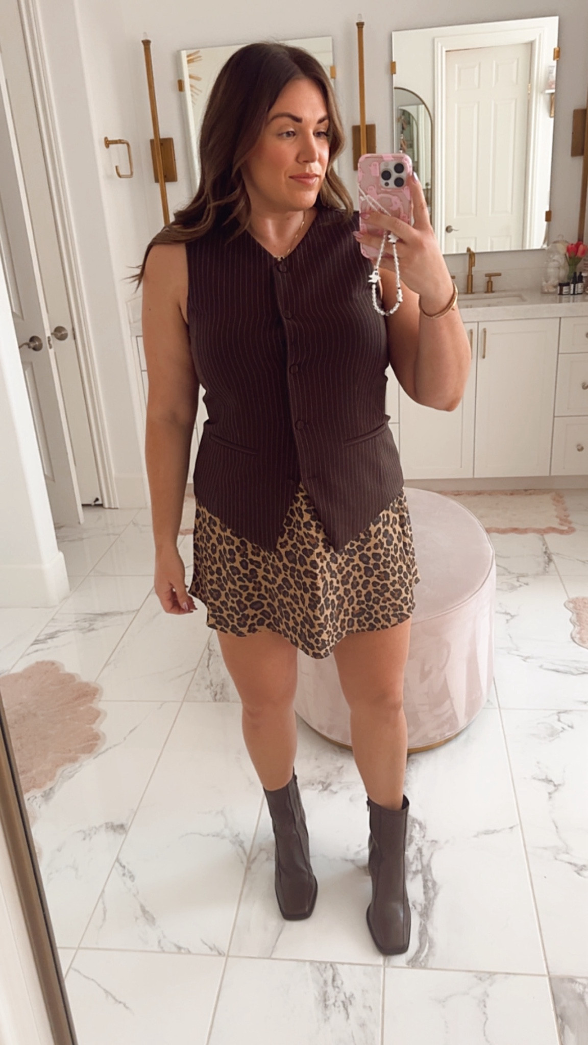 curvy fall outfit! wearing size large in chocolate brown pinstriped vest and size large in leopard skort 

#LTKSeasonal #LTKMidsize #LTKFindsUnder100