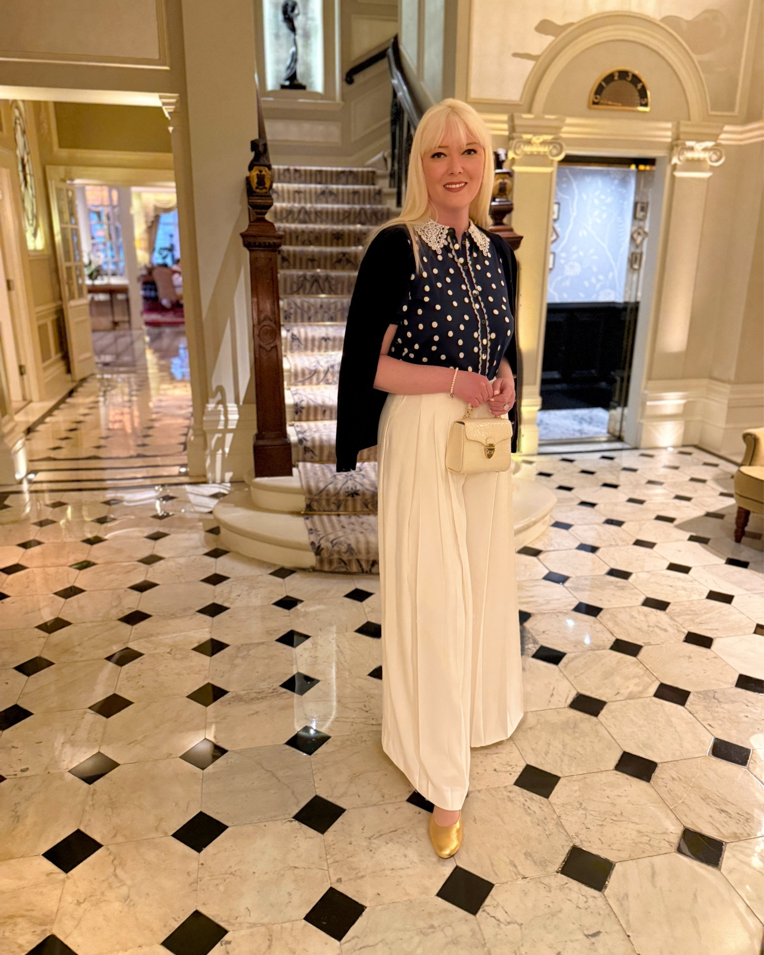 Classic navy and ivory for a dinner date - I LOVE these super wide leg floaty trousers which remind me of 1930s styles. Partner with polka dots and Mary Jane’s, a top handle bag and a cashmere cardigan thrown over your shoulders for vintage inspired date night style. 

Polka Dot Navy Jersey Blouse with Crochet Collar, Regent Wide Leg Trousers in Ivory and Navy Cashmere Cardigan - Boden

Mini Mayfair Top Handle Bag - Aspinal of London 

Gold Mary Janes - Augusta at Smallable

Pearl Drop Earrings and Timeless Bracelet - Dower & Hall

#LTKuk #LTKeurope #LTKdatenight