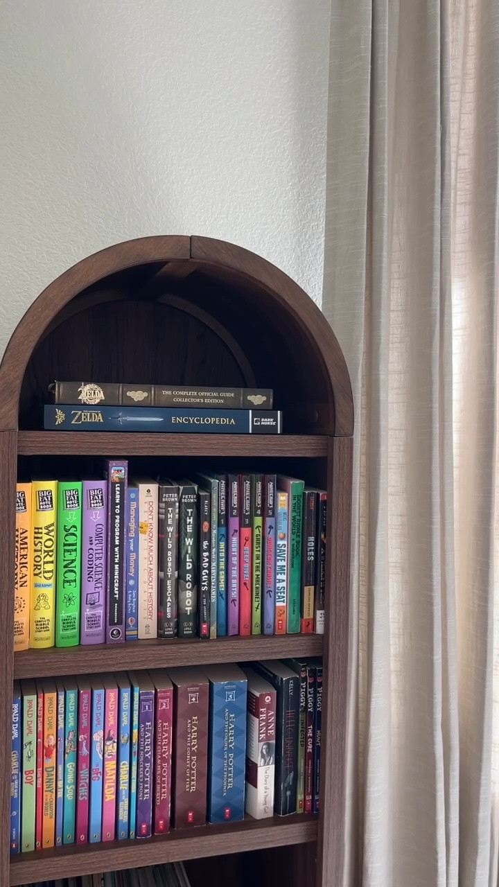 I can’t believe this arched bookcase is from Walmart! 📚 Available in 4 colors - walnut (seen here), light honey, green and black.

#LTKKids #LTKHome