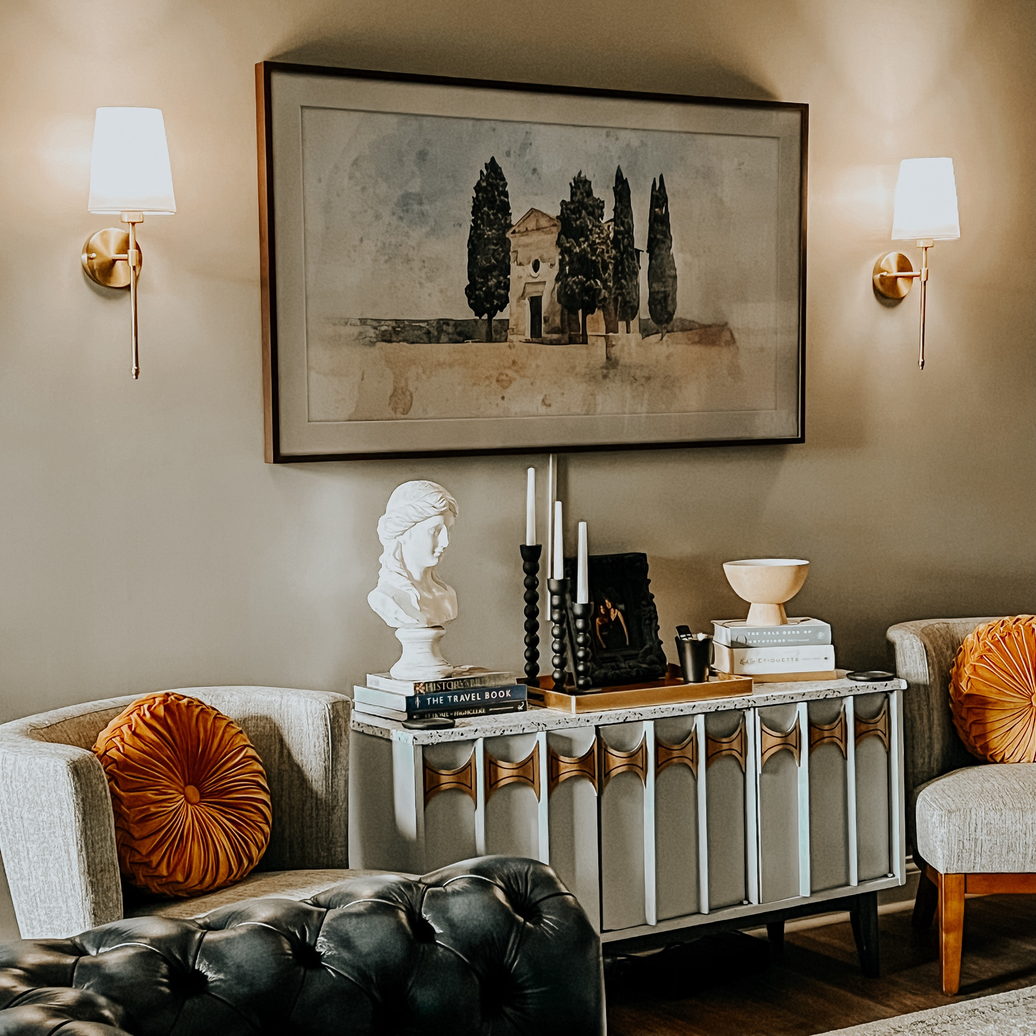 I originally considered doing a gallery wall around my Frame TV but it didn’t seem quite right. Instead, I went with these easy-to-install, rechargeable sconces. I really love how they add a touch more decent my home library without being too much. They are operated by a remote and are easy to recharge! 

#LTKfindsunder100 #LTKhome