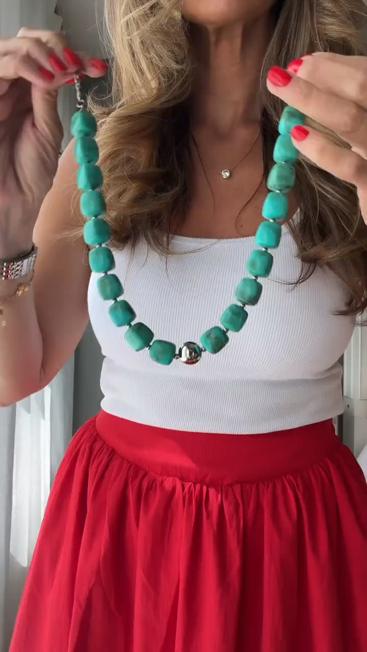 TRENDING! This red skirt is such a fun statement piece for summer. I paired it with a simple white tank and colorful accessories, and it instantly looks polished. Perfect for summer parties, vacation dinners, holiday weekends, or whenever you want an outfit that feels effortless but still turns heads.

red skirt outfit, summer style, patriotic outfit, holiday weekend outfit, white tank outfit, colorful accessories, vacation outfit, summer fashion, midi skirt, feminine style, casual chic outfit, summer trends, elevated basics, themominstyle

#LTKootd #LTKmomlife #LTKTravel