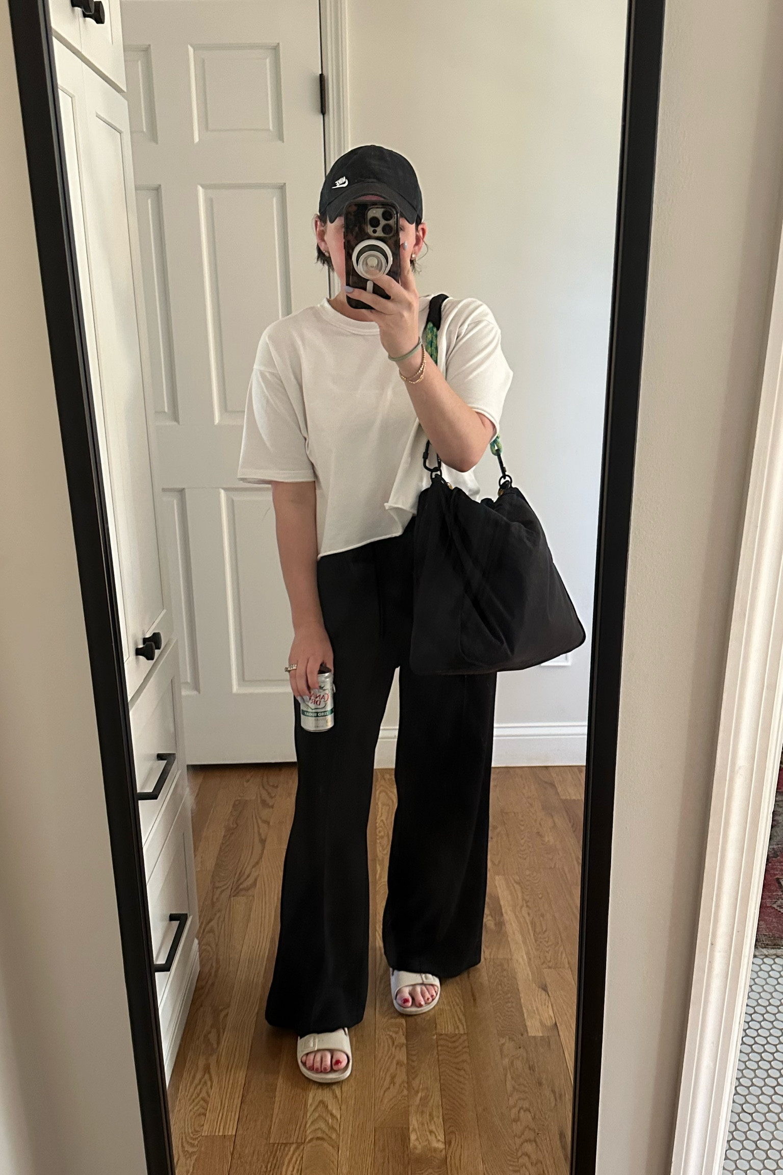 black flare leggings
white crop-ish tee
black nike logo baseball hat
freedom moses slide sandals

casual mom style, casual women’s fashion, sports mom

#LTKStyleTip #LTKSeasonal #LTKActive