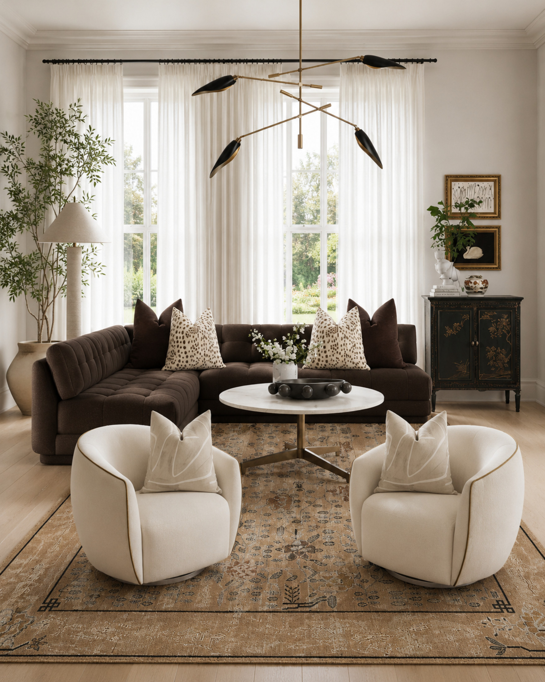 This room is exactly why contrast matters. The deep chocolate sofa grounds the space, the ivory chairs keep it feeling soft, and the vintage-style rug pulls everything together without making the room feel too polished. I love the mix of classic details, sculptural lighting, and warm neutrals here — refined, cozy, and still easy to live with.

I may receive a commission when you shop through my links. 

 #LTKHome