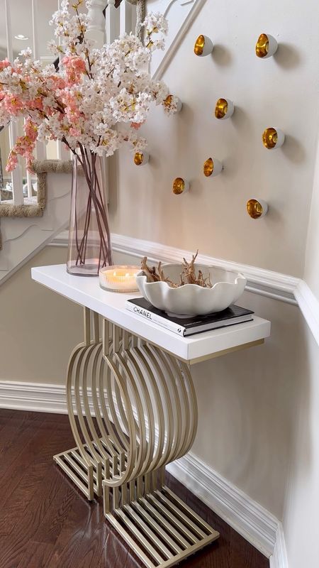 Console styling for spring 🌸 console styling, floral arrangements, flowers, spring decor, home decor , white and gold decor 

#LTKhome #LTKsalealert #LTKfindsunder50