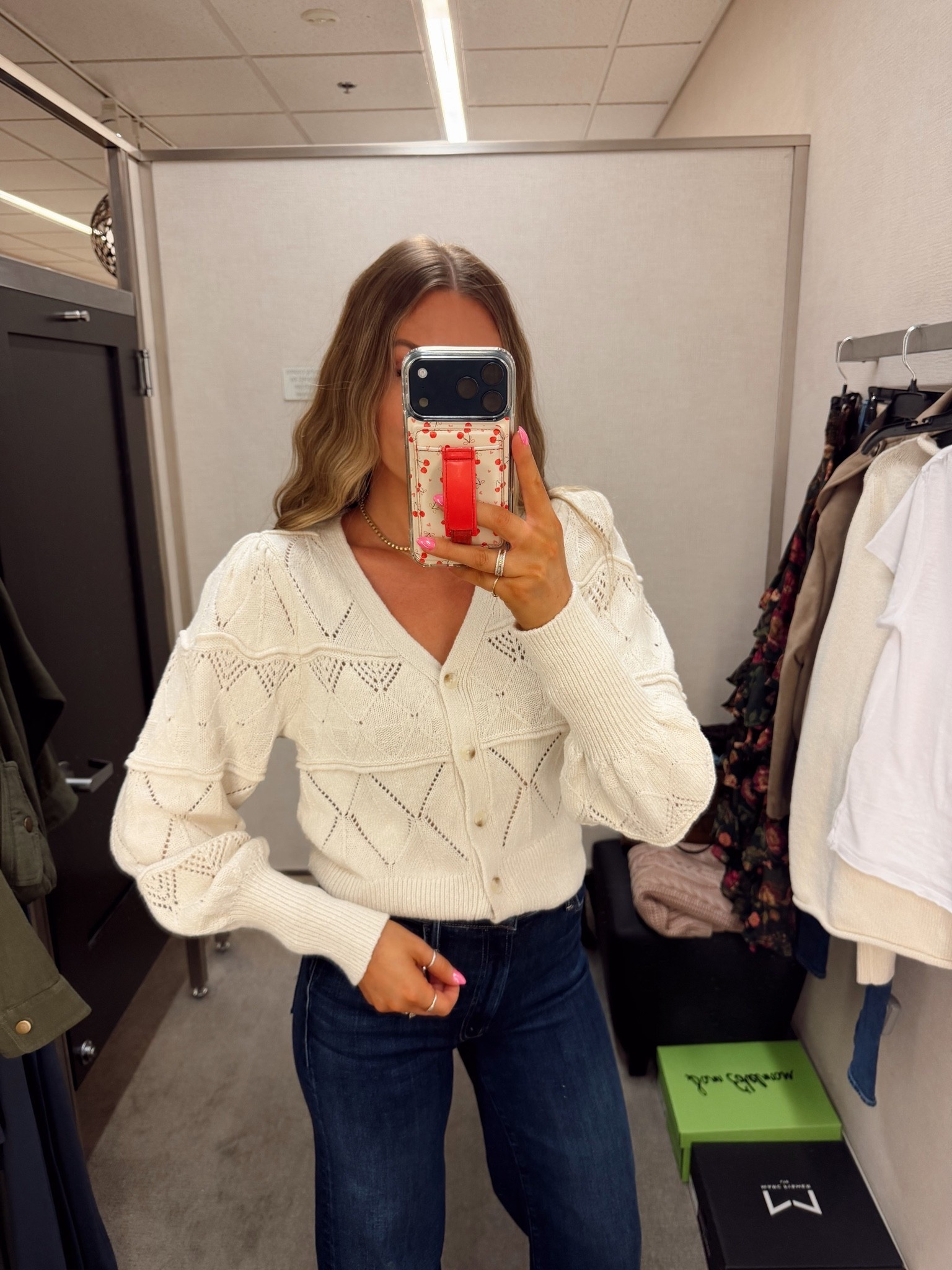 The perfect cream cardigan sweater on sale! Wearing a small