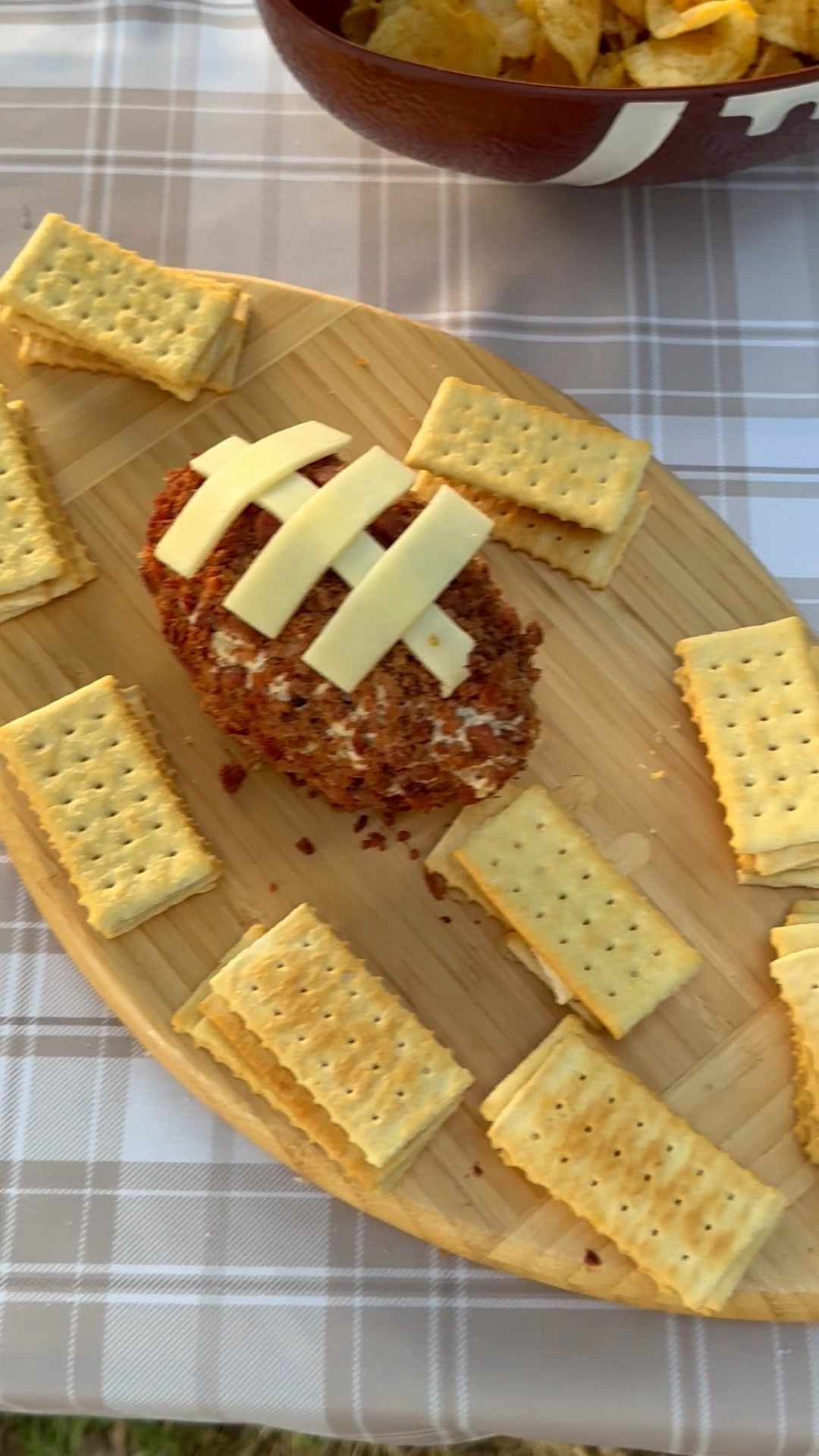 #ad This football shaped cutting board from @Wayfair is perfect for your tailgate! I made a football out of creamy garlic and herb cheese and topped it with bacon bits. I then sliced thin cheese to make laces! The club crackers paired well with this appetizer! 🏈 #wayfair #wayfairpartner

#LTKHome #LTKSaleAlert #LTKSeasonal