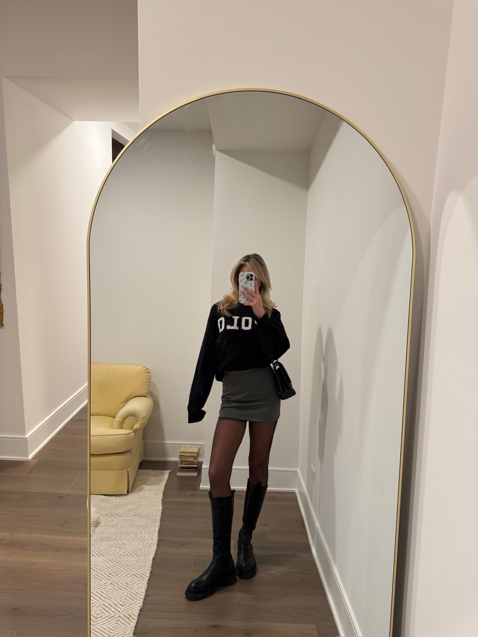 Cute and casual ootd 🖤 

polo sweater, aritzia skirt, black boots, chic style, trendy fashion 

 

#LTKStyleTip