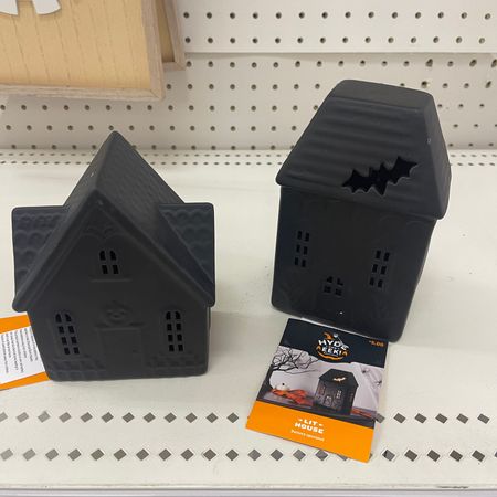 $5 ceramic haunted houses with led light for the perfect monochromatic haunted village! They have similar ones every year, so you can grow your village!

#LTKhome #LTKHalloween #LTKSeasonal
