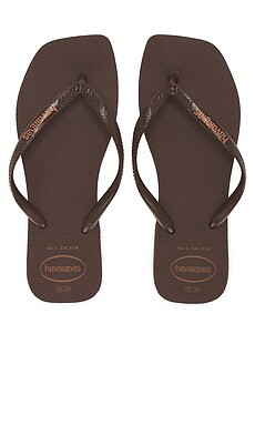 Havaianas Slim Square Logo Flip Flops in Dark Brown from Revolve.com | Revolve Clothing (Global)