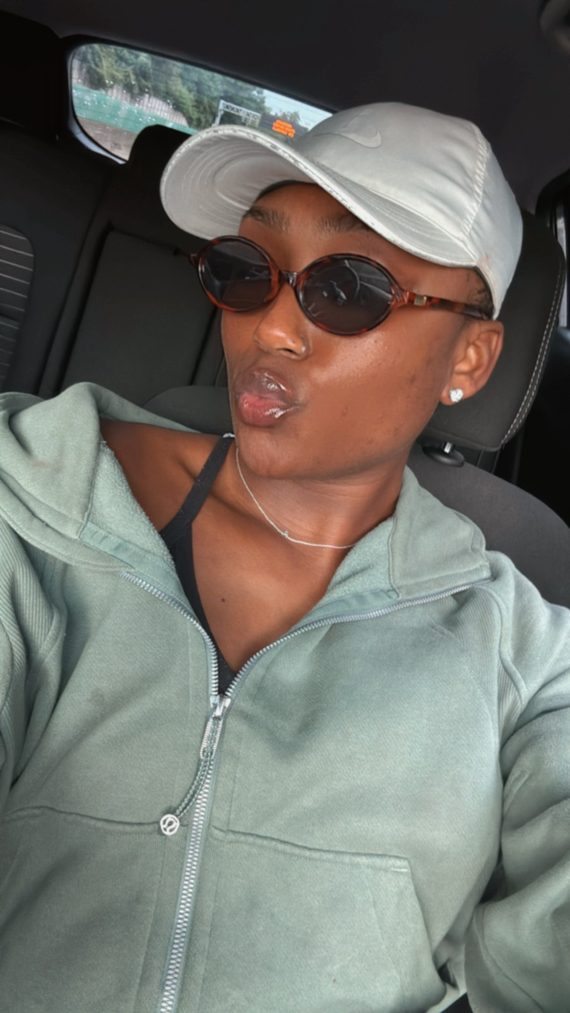 Car selfie vibes in my cozy sage hoodie! ✨ This color is everything and so perfect for running errands or casual days out. Comfort meets style! #CarSelfie #SageGreen #CozyVibes #OOTD #CasualStyle