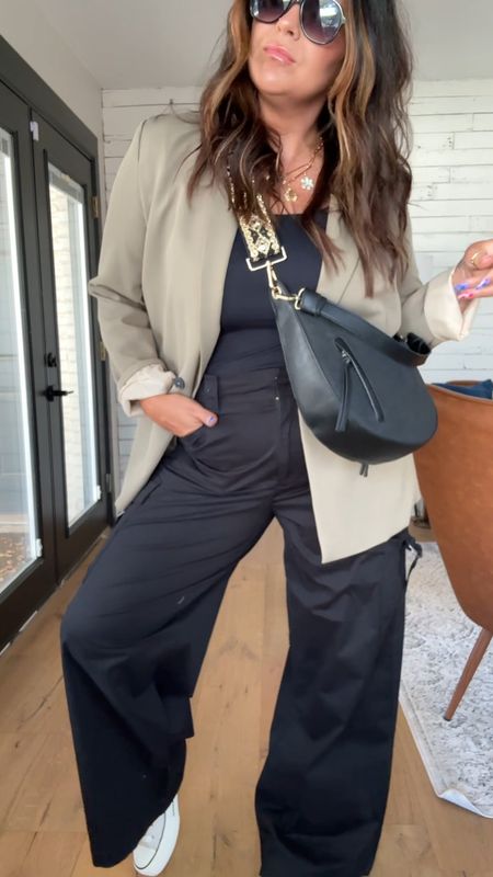 Wide leg cargo pants styled up!
Cargo pant: 14
Tank: XL
Blazer: XL
converse high top platform: size down 1/2 size
Bag is Walmart, strap is Amazon


#LTKstyletip #LTKmidsize #LTKfindsunder50