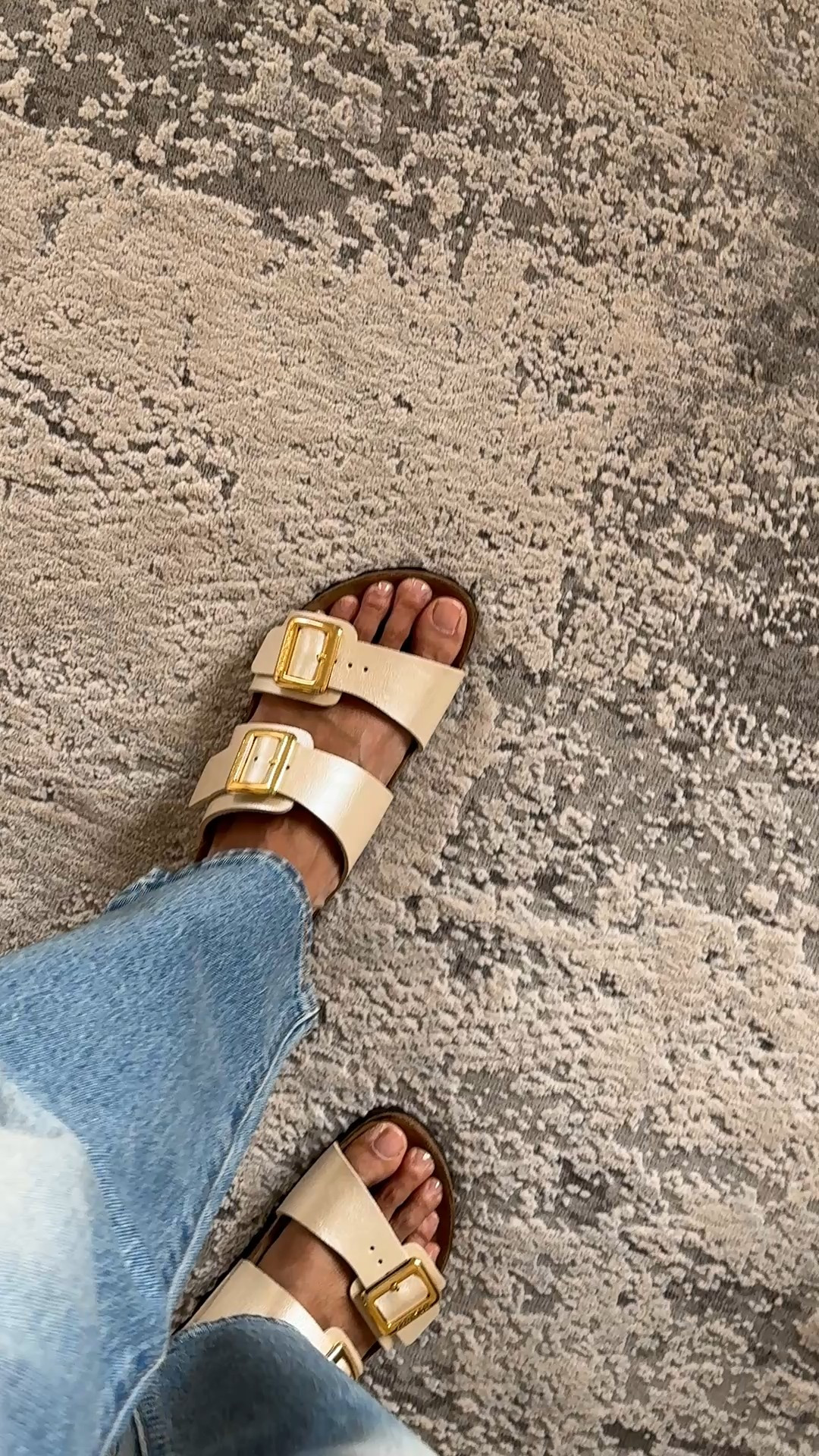 New Birkenstock style. Birkenstocks. Slide sandals. 
I love the rectangular gold buckles and the subtle shimmery neutral color. True to size for Birkenstocks. Narrow width  

#LTKTravel #LTKOver40 #LTKShoeCrush