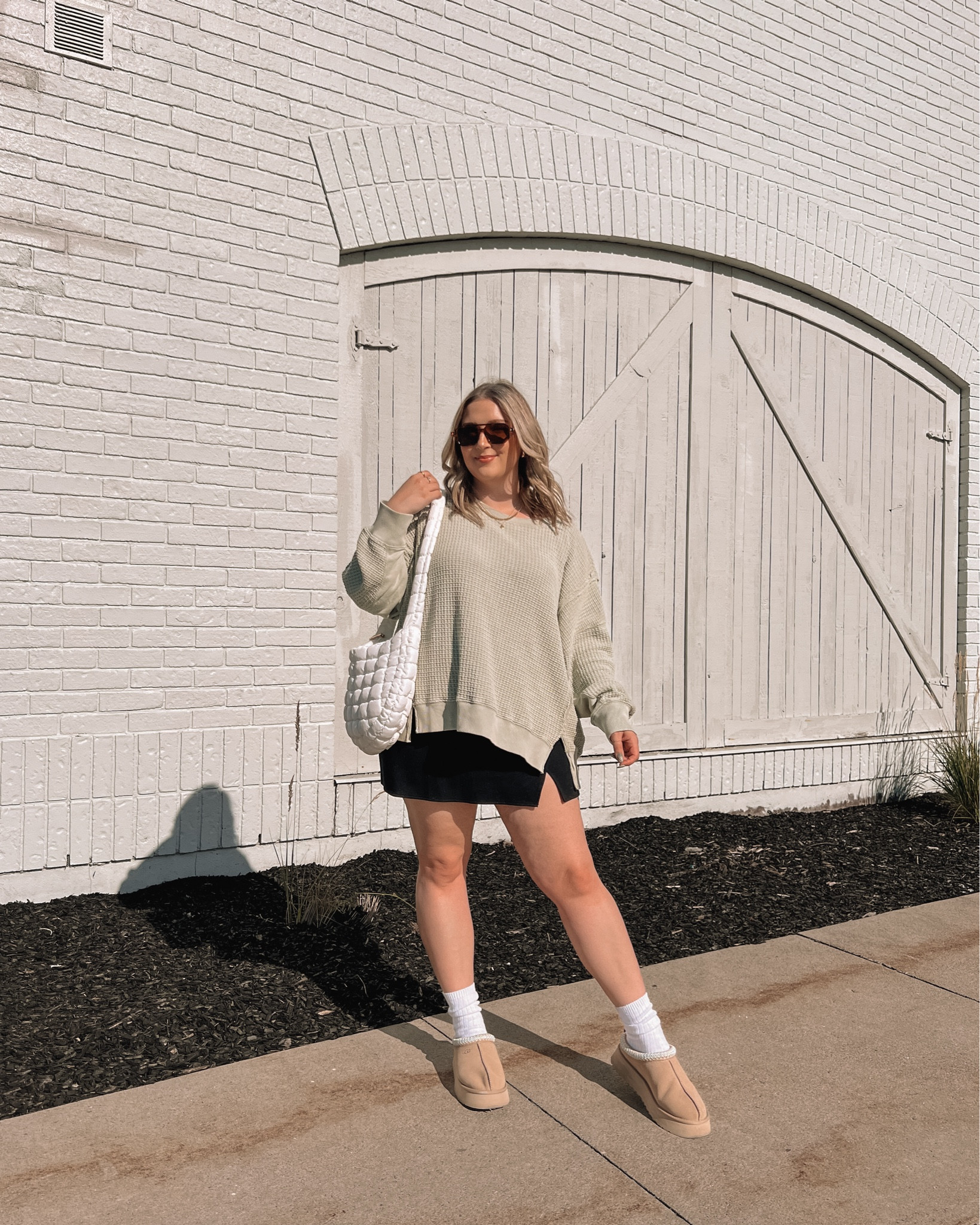 Comfy midsize fall outfit - oversized sweatshirt (L), black mini skirt (linked similar), Ugg tazz platforms (if between sizes go with your larger size), Amazon puffer bag



#LTKcanada #LTKmidsize #LTKautumn