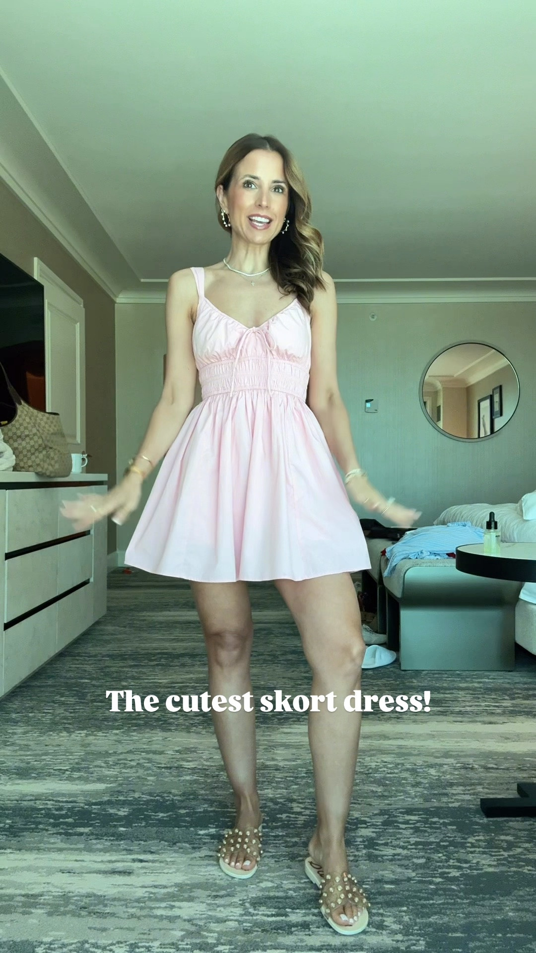 The cutest little skort dress in XXS regular with adjustable straps. Has shorts underneath. Vegas outfit. Summer outfit. Vacation outfit. Vacation dress. Summer dress. Pearl jelly slide sandals are TTS.

#LTKootd #LTKTravel #LTKPetite