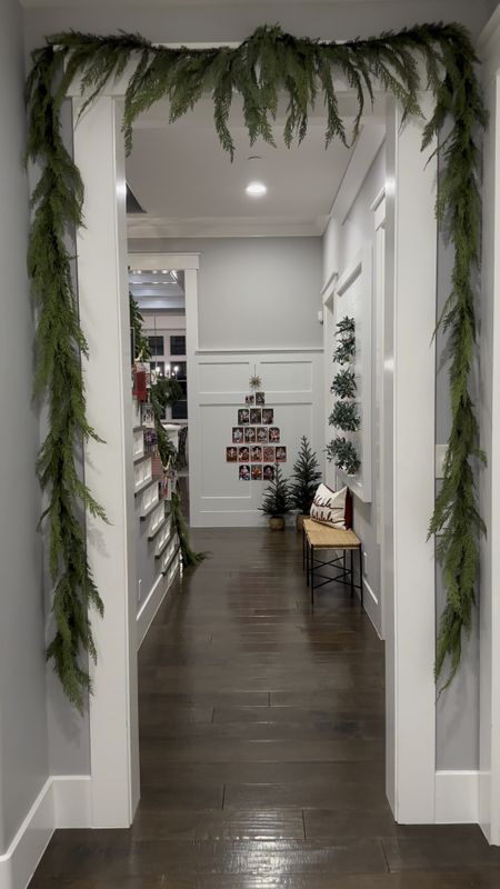 Santa pics and our family Christmas cards through the years make this hallway my favorite spot in our home. 🎅🏻🥰

#LTKhome #LTKHoliday #LTKSeasonal