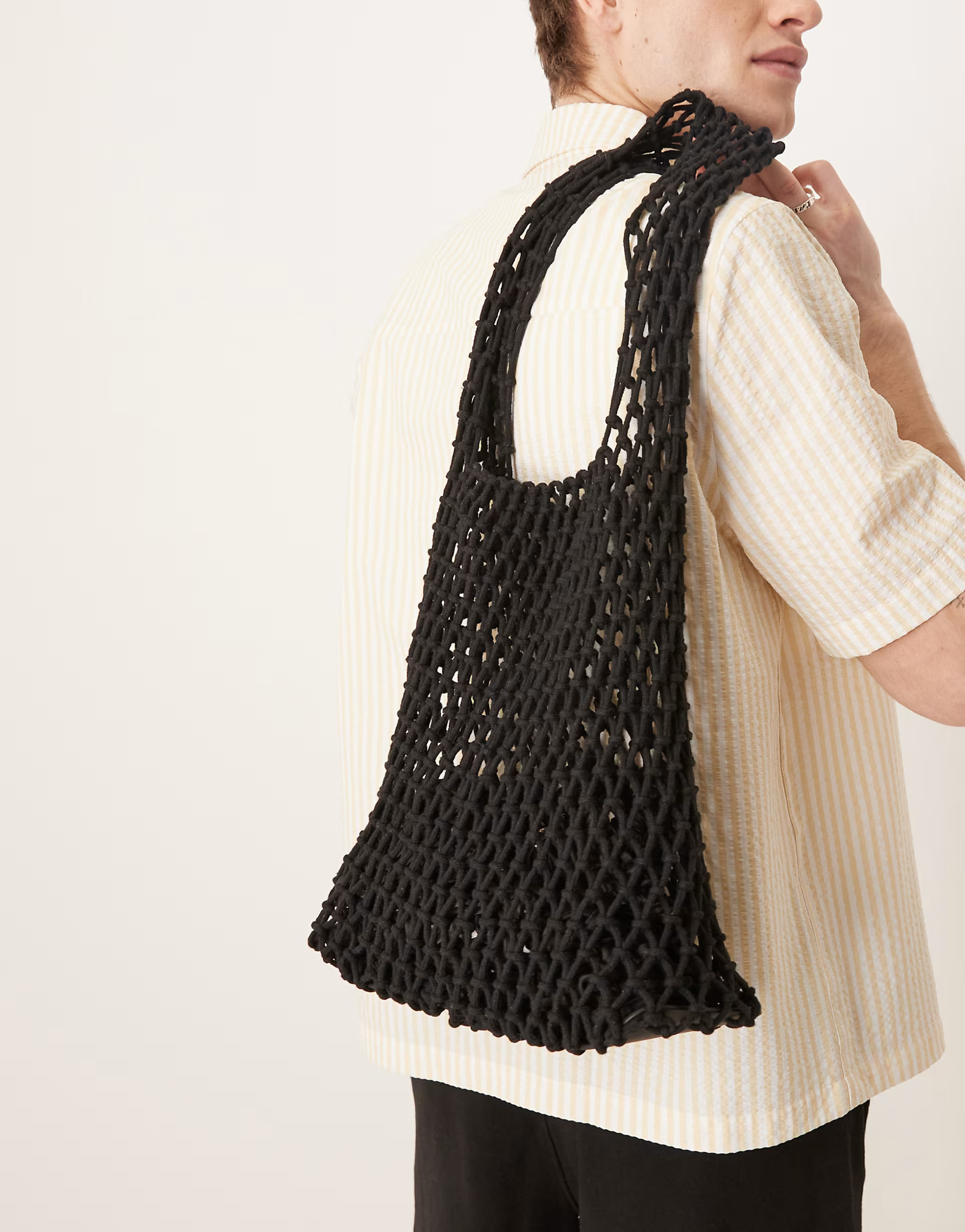 ASOS DESIGN woven crochet sling tote bag in black | ASOS (Global)