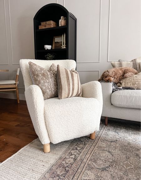 I love the cozy vibes that this Sherpa chair being to my living room decor! The texture of the chair layered over the jute rug it’s perfection! And as you can see - brown is my “pop of color” because I love neutrals! 

#LTKhome #LTKFind