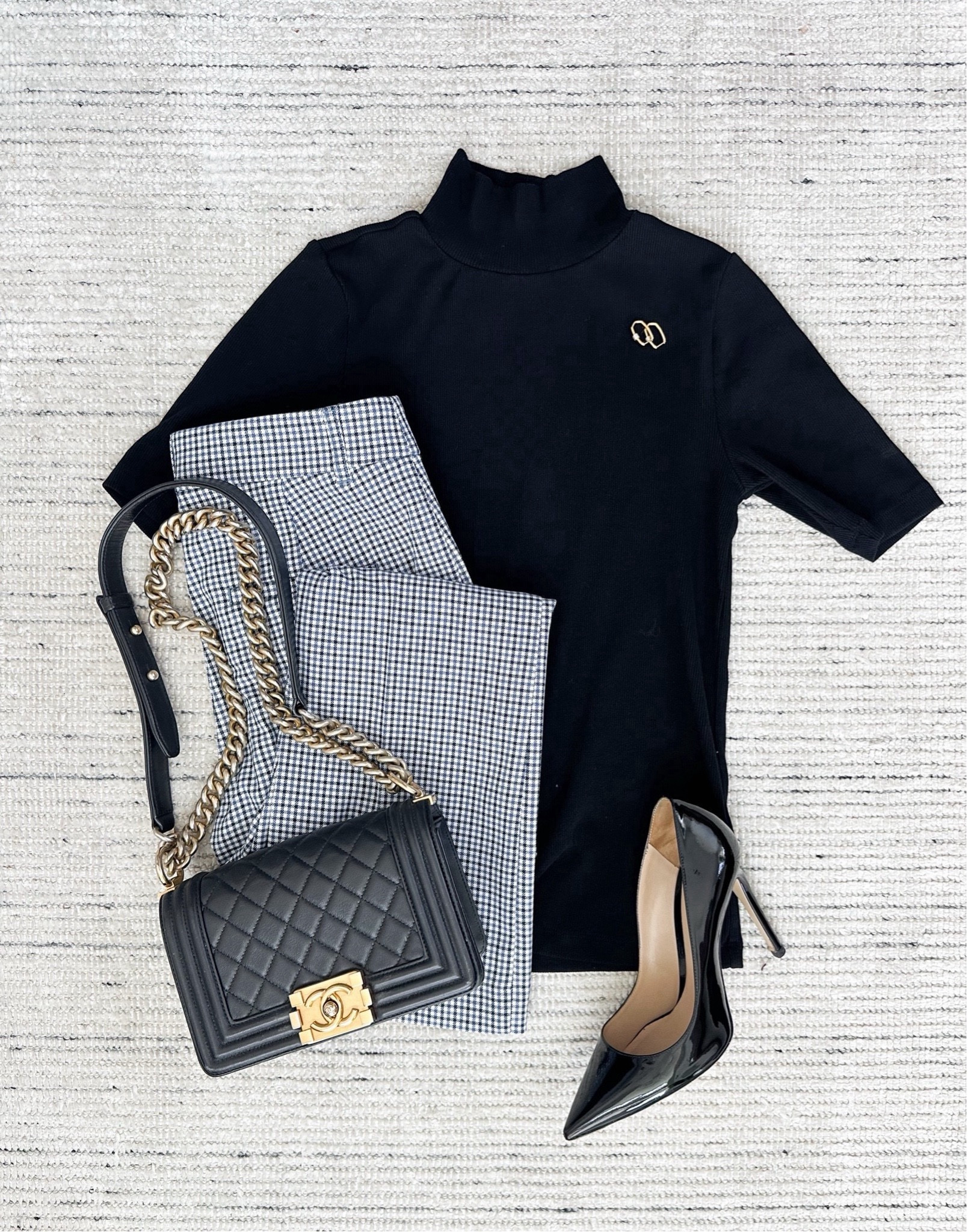 Houndstooth work pants paired with black mockneck and pumps for a classic look. Outfit on sale for 40% off plus an additional 15% off

#LTKStyleTip #LTKSeasonal