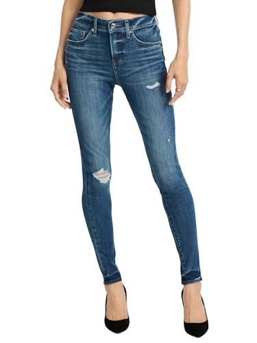 EXPRESS Women’s Ripped Skinny Ankle Jeans – Mid Rise Stretch Denim with Distressed Detailing and Flattering Fit – Dark Denim | Amazon (US)