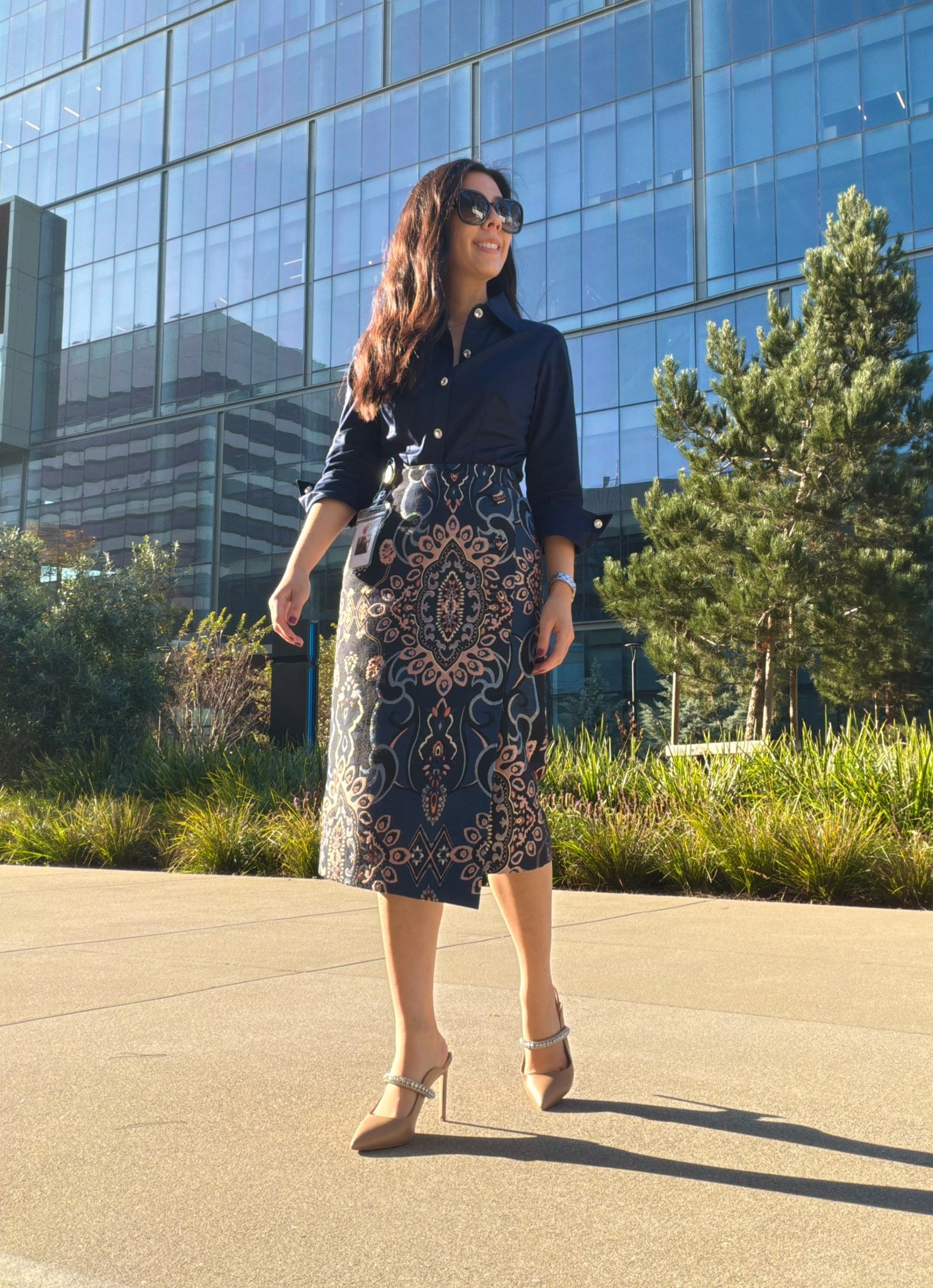 Playing with blues today! If there’s an opportunity to spruce up an otherwise boring item, I’ll take it! I was looking for a crisp collar button down and this midnight blue one caught my eye. The glistening buttons were the first thing to stand out among all the other classic pieces on display; I knew I had to add this to my collection immediately! Instead of opting for a simple bottom, I paired this top with an asymmetrical brocade pencil skirt. To add a little more jazz to this look, I wore my jeweled Kurt Geiger heeled mules - the silver crystals that span the top of these heels match the buttons on the button down!

#pencilskirt #brocadeskirt #blueoutfit #buttondown #corporatestyle #classyoutfit #oldmoney #businesscasual #9to5style 

#LTKPetite #LTKWorkwear #LTKootd