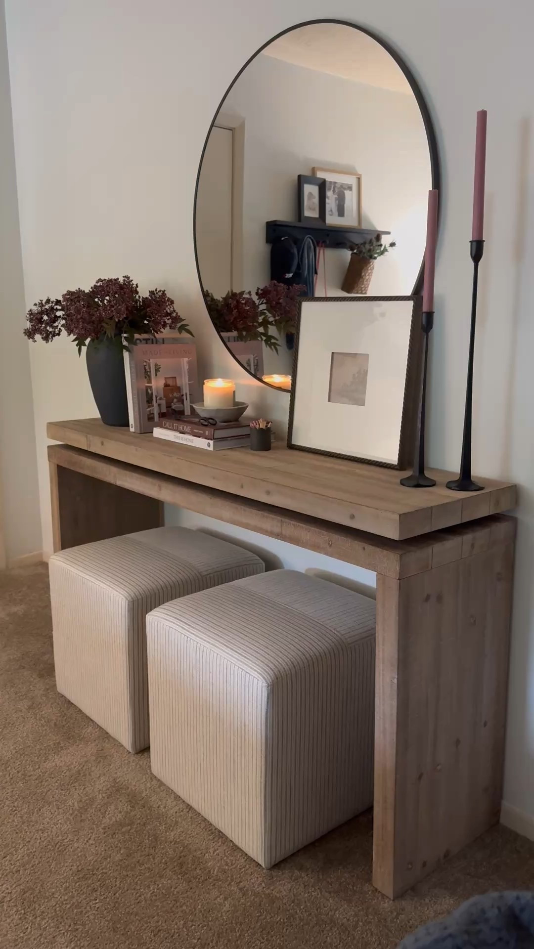Spring console styling, wood console table, arwah console table, stripe ottomans, round mirror , coffee table books, berry stems, mauve berry stems, spring stems, summer stems 

#LTKSeasonal #LTKSaleAlert #LTKHome