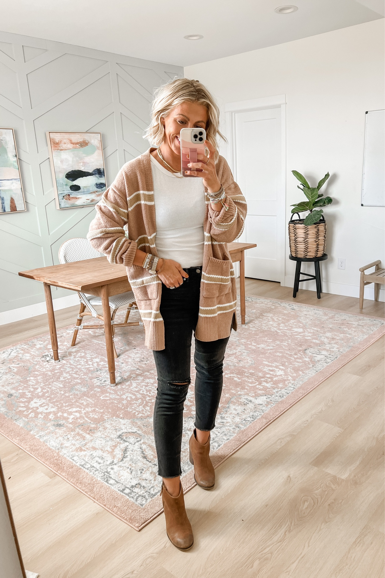 Khaki striped cardigan
Wearing medium 
$38
Comes in a few colors

Jeans and boots are true to size  

#LTKworkwear #LTKSeasonal #LTKunder50