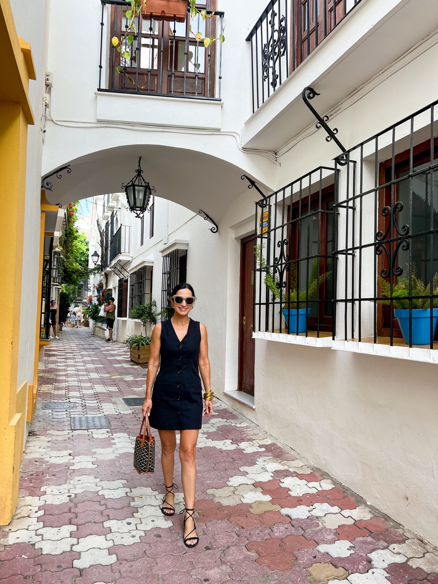 Linen Abercrombie dress with buttons and comfy Amazon lace up sandals, perfect for strolling the streets of Marbella Spain! Size down in the dress is you’re between sizes. Wearing XXS. 

#LTKOver40 #LTKSaleAlert #LTKFindsUnder100