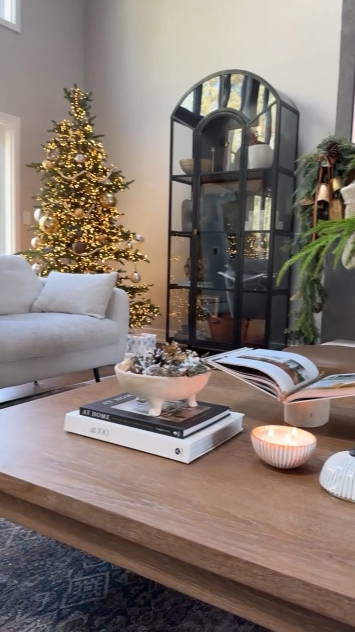 I especially love our great room during the holidays! Styling my favorite furniture pieces with seasonal decor brings me so much joy! This stunning display curio cabinet is on sale right now and so is my sideboard!! Both at Lulu & Georgia and up to 30% off!! 

#LTKHome #LTKSaleAlert #LTKCyberWeek