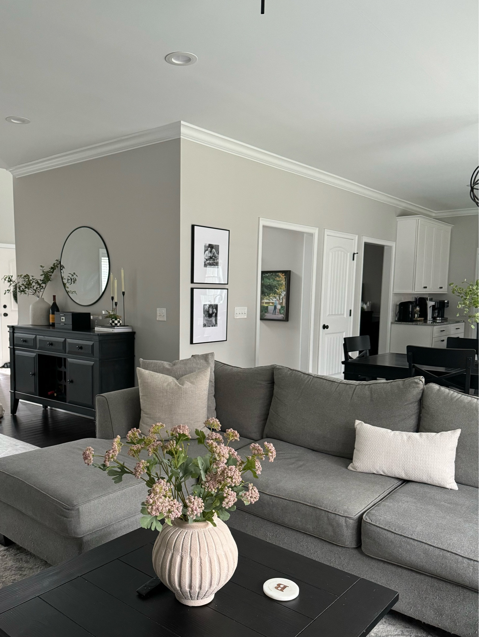 Living room neutral decor 

Server cabinet, sectional couch, ceramic vase


#LTKfamily #LTKMostLoved #LTKhome