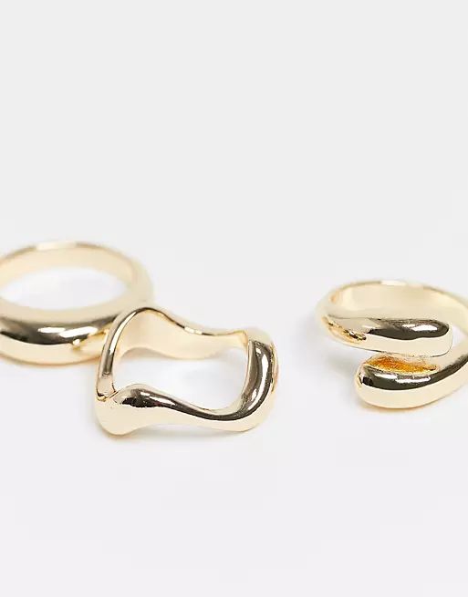 ASOS DESIGN pack of 3 rings in mixed design in gold tone | ASOS (Global)