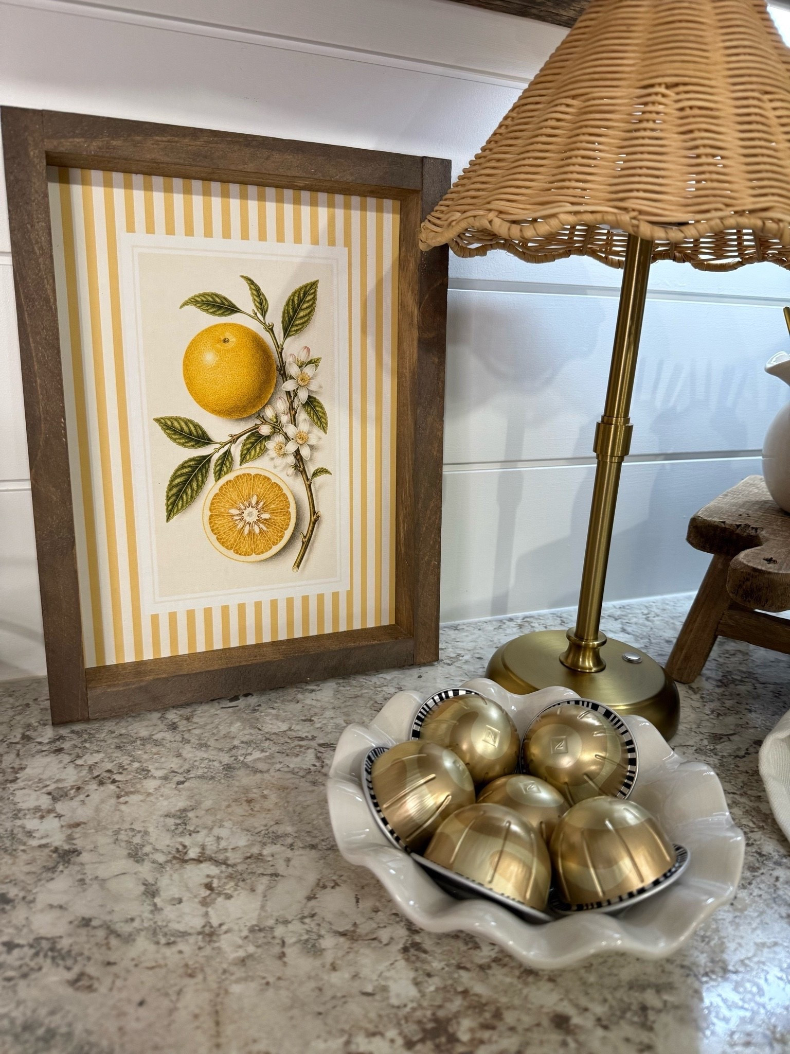 Lemon Coffee Bar Artwork. This little lemon coffee bar moment instantly made my kitchen feel brighter and more pulled together. The framed citrus artwork is such a fun seasonal touch and the warm Briarsmoke stain gives it that perfect cozy vintage feel. Mine is the 9x12 size and you can use code FARMTOTABLE for 15% off. Paired it with my favorite woven lamp and coffee setup for the cutest little corner.

#coffeebar #kitchendecor #coffeebarstyling #lemondecor #amazonhome

coffee bar decor | lemon artwork | kitchen styling | woven lamp | neutral kitchen | citrus decor | cozy kitchen | countertop decor | vintage inspired decor | briarsmoke stain | coffee station | home decor finds | kitchen counter styling | cottage inspired decor | warm neutral home | amazon kitchen finds | framed artwork | seasonal kitchen decor | small kitchen details | cozy corner | lamp decor | home styling ideas | kitchen accessories | neutral decor |