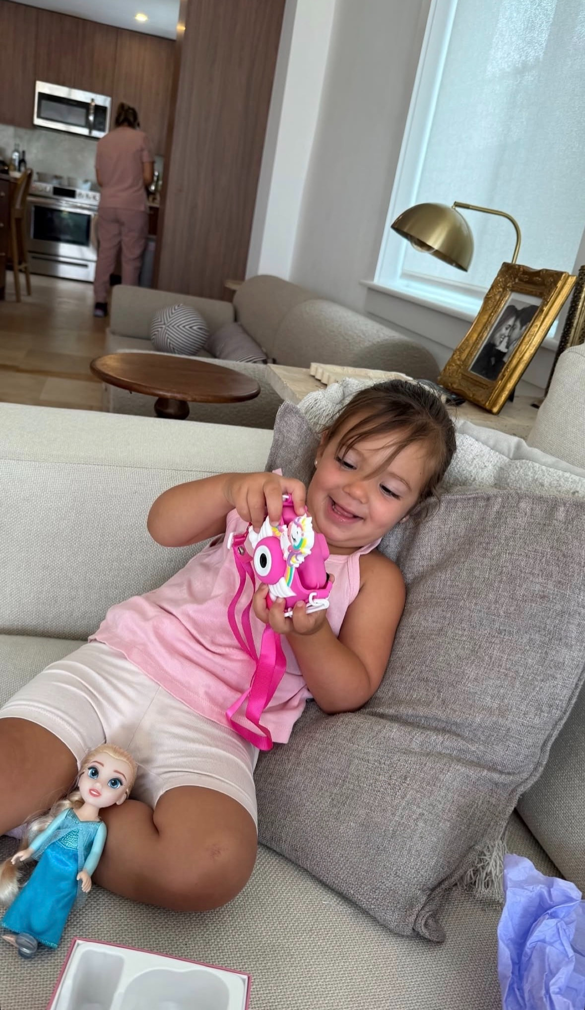 Little photographer in the making with her favorite pink toy camera 📸🦄💖 

 #LTKdayinmylife #LTKmomlife #LTKKids