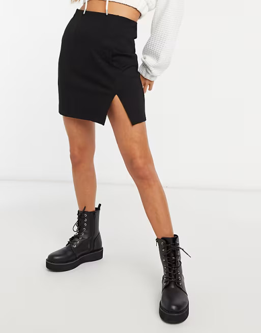 Stradivarius mini skirt with slit hem in black | ASOS (Global)