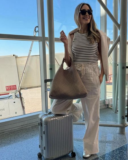 Airport travel outfit idea for a warmer destination 
Everything runs tts. Wearing a size small 



#LTKStyleTip #LTKTravel #LTKU