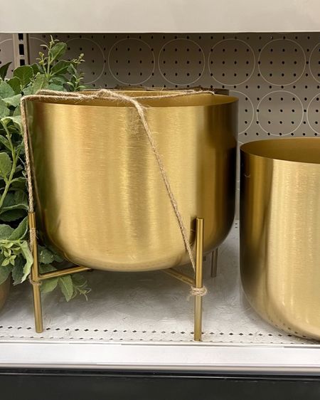 Brass indoor planters that I saw in Target. They have mid-century style and would look great in the corner of a contemporary style living room or foyer. 

#LTKstyletip #LTKhome #LTKfindsunder100