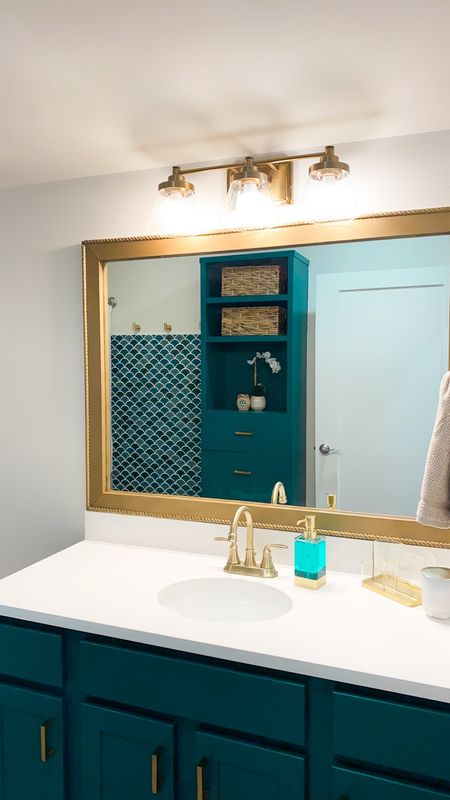 Our loft bathroom is one of my favorite places I have redone in our house so far. The color, storage and tile all brought this builder basic space up to a custom space that I can’t wait to use for baby! #breezingthrough #breezingthroughhome #breezingthroughdiy #diy #diyprojects #homeprojects #bathroomupgrade #bathroomrenovation 

#LTKunder50 #LTKunder100 #LTKhome