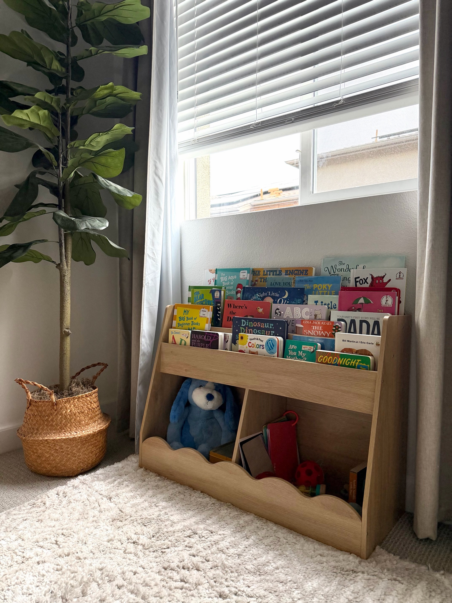This bookshelf is so cute in Ollie’s room, and I love the little wave detail on it. It was also super easy to build, which always feels like a win. Such a good little piece if you want something functional but still cute for a nursery or kid room.
-

kids bookshelf, nursery bookshelf, baby room bookshelf, toddler bookshelf, nursery furniture, bookshelf for nursery, kids room storage, baby room decor, wave bookshelf, scalloped bookshelf, cute nursery furniture, nursery organization, bookshelf for baby room, Montessori bookshelf, front facing bookshelf, kids book storage, nursery must haves, nursery decor finds, playroom bookshelf, baby bookshelf, easy to assemble bookshelf, nursery room finds, first time mom nursery finds, kids room decor

#LTKBaby #LTKKids #LTKmomlife