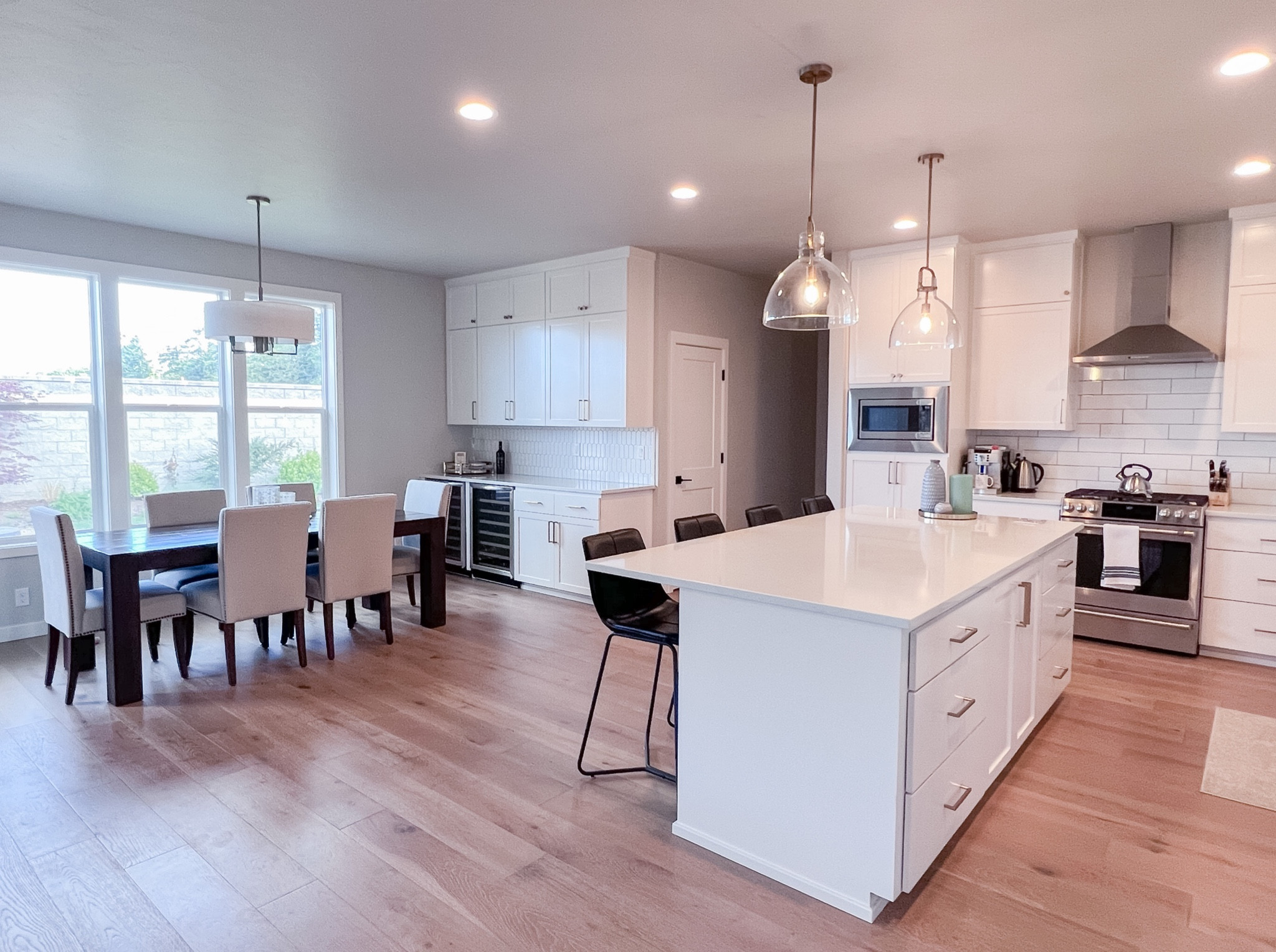 Refresh your kitchen with these counter stools from West Elm. Stylish, timeless and simple. Pair upholstered dining chairs with a rustic table for a cozy look. Also these glass pendant counter lights and dining room chandelier. #competition

#LTKfamily #LTKFind #LTKhome