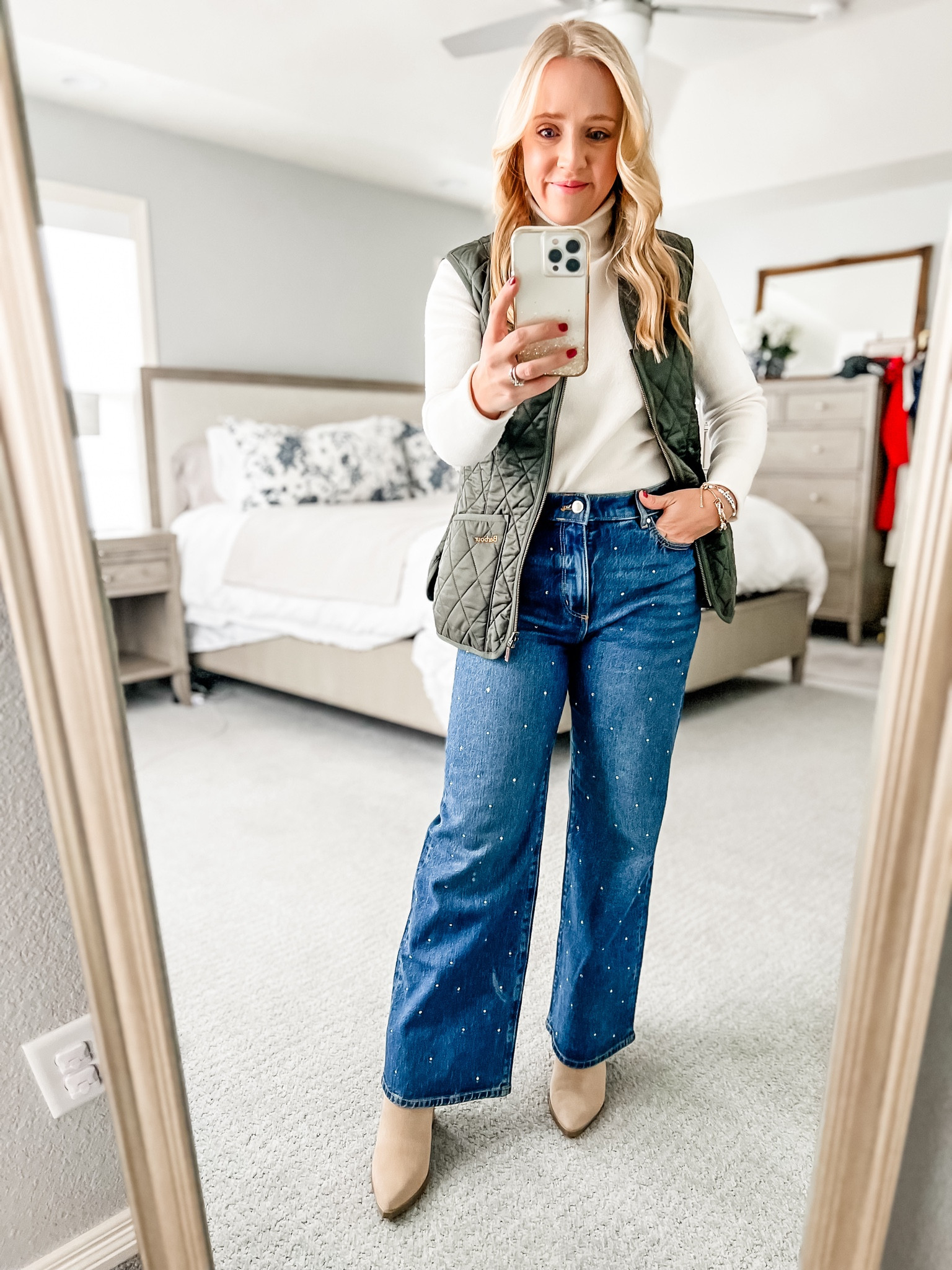 These embellished jeans are perfect for the holiday season! Petite sized jeans that fit tts. Quilted vest and turtleneck fit tts. Exact pointed boots linked in a darker color. 
Jeans. Wide leg jeans. Petite outfit. Winter outfit. Embellished jeans. Quilted vest. 

#LTKStyleTip #LTKSeasonal #LTKSaleAlert